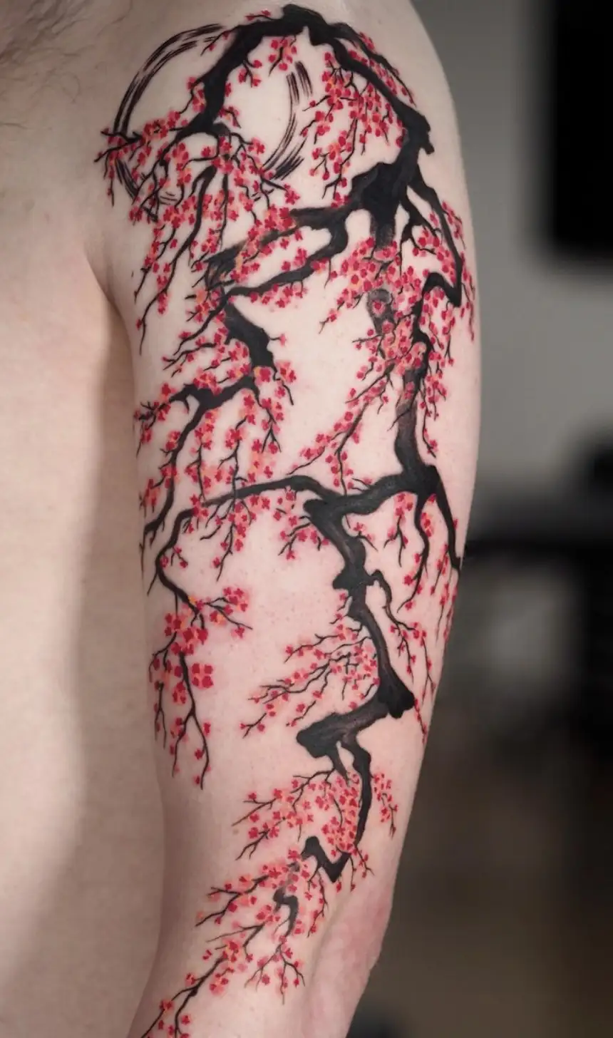 Illustrative cherry blossom tree tattoo with vibrant red colors by Ayah at Omnia Tattoo Melbourne